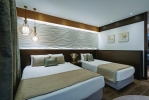 Кровать или кровати в номере Papillon Belvil Holiday Village
