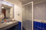 Ванная комната в Stella Di Mare Beach Resort & Spa
