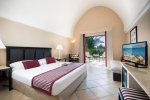 Кровать или кровати в номере Jaz Belvedere Resort