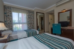 Кровать или кровати в номере Aurora Bay Resort Marsa Alam