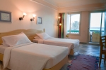 Кровать или кровати в номере Coral Beach Resort Tiran (Ex. Rotana)