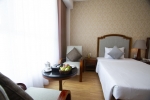 Кровать или кровати в номере VDB Nha Trang Hotel