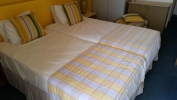 Кровать или кровати в номере The Caravel Hotel